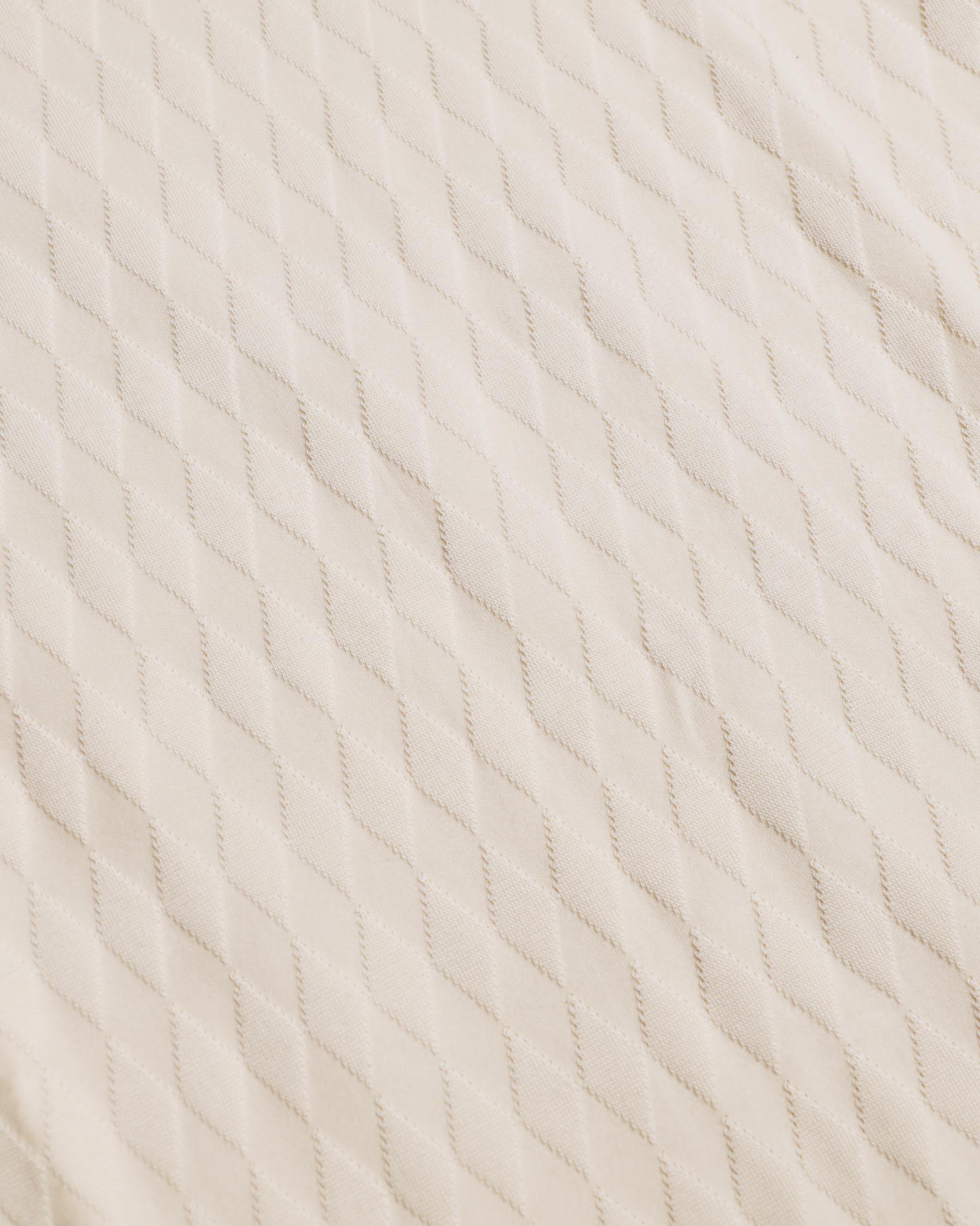 25.10 T-Shirt Tessuto Operato